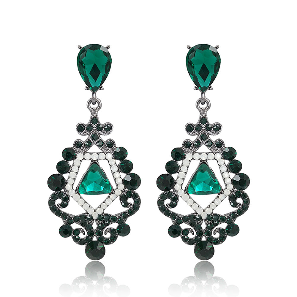 Pendientes de esqueleto de aleación de zinc de dhinestona al por mayor